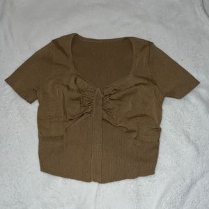 Short sleeve crop top, color khaki. Ruched front, knit neck size medium